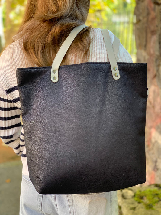 Bolso tote azul marino con asas de cuero